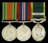 Three: Private T. Pavey, Devonshire Regiment

Defence and War Medals 1939-45; Efficiency Medal G.VI.R., 1st issue,...
