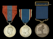 Three: Mr. G. S. Scobell, Chargeman of Iron Caulkers, H.M. Dockyard, Devonport, who was awarded the Royal Humane...