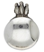 A silver and parcel gilt novelty caddy spoon, the handle modelled as three penguins, by Stuart Devlin, London 1980,...