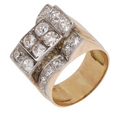 A diamond ring, circa 1940, of odeonesque bicolour design, set throughout with old brilliant-cut diamonds, to a...