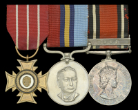 The unique Bronze Cross of Rhodesia (B.C.R.) and Queen’s Best Shot Medal group of three awarded to Lieutenant A....