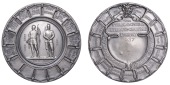 The Public Schools Veterans Challenge Trophy, 1937, a silver prize medal by Elkington & Co. for the National Rifle...