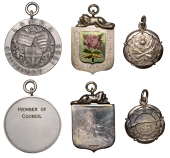 National Rifle Association, Rifle Clubs, a silver medal, overlapping British flora, rev. rifle right, 22 x 27mm,...