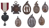 An Assortment of Medals from the National Rifle Association, English Eight Club, 1939, a bronze medal, 25 x 30mm;...