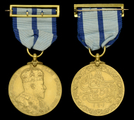 Delhi Durbar 1903, gold (22ct., 58.31g), unnamed as issued, with integral top gold riband buckle, minor edge bruise,...