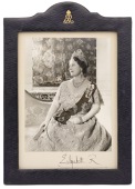 Royal Interest: A signed black and white portrait photograph of HM Queen Elizabeth, The Queen Mother (1900 - 2002),...