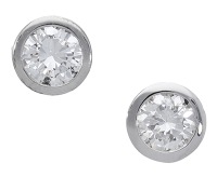A pair of diamond ear studs, each brilliant-cut diamond mounted in 18ct gold, UK hallmark, total diamond weight...