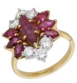 A ruby and diamond cluster ring, set with marquise-shaped rubies and brilliant-cut diamonds, mounted in 18ct gold,...