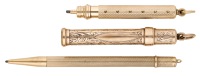 Three 9ct gold pencil fobs, the first engine-turned, retractable, hallmarked, by Sampson Mordan & Co, London 1915;...