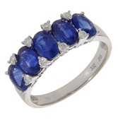 A sapphire and diamond ring, set with five oval-cut sapphires with brilliant-cut diamonds between, stamped...