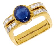 A sapphire and diamond dress ring, the oval cabochon sapphire between shoulders channel-set with step-cut diamonds,...