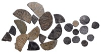 Fractional and minim-sized lead tokens (24), including a group of 10, 7-10mm each, at least two of which are of the...