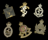 Officer’s Forage Cap Badges.
A good selection of bronze, silver and gilt examples including Royal Army Ordnance...