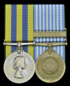 Pair: Lance-Corporal J. Davies, Gloucestershire Regiment, late Welsh Guards, who was seriously wounded in the...