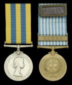 Pair: Private W. E. Kear, Gloucestershire Regiment, who was captured and taken Prisoner of War at the Battle of...