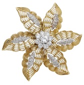 A mid 20th century diamond brooch, the flowerhead with openwork petals set with single-cut diamond highlights, with...