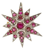 A ruby and diamond star brooch, circa 1890, set throughout with circular-cut rubies, with old brilliant-cut diamond...