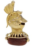 A 19th century gold swivel fob seal, the hardstone scarab bead seal carved to depict a centaur, the surmount...
