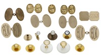 A collection of cufflinks and studs, to include a pair of cufflinks and a button each with a crowned boar’s head...