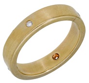 A diamond ring, the polished band inlaid with brilliant-cut diamonds, ring size P - Q. 	 £200-£300