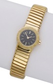Bulgari. A lady’s gold bracelet watch, Tubogas, circa 2010.
Movement: quartz.
Dial: black, Arabic and baton...