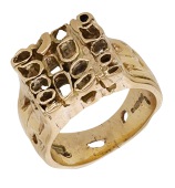 A 9ct gold dress ring by Albion Craft Company, circa 1970, composed of raised pierced hoops, the decoration...
