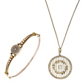 Two seed pearl jewels, circa 1900, comprising an opal and seed pearl pendant of circular knifewire design, and a...