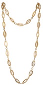 A fancy-link necklace, composed of openwork lozenge-shaped batons with scalloped edging, Italian assay mark for Or....