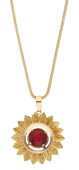 A flowerhead pendant, the circular-cut red paste within a ropetwist and textured petal border, to a spiga-link chain...