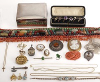 A quantity of miscellaneous items, comprising a silver cigarette case, a coral flower brooch, a shell cameo brooch,...