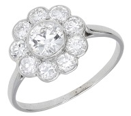 A diamond cluster ring, set with old brilliant-cut diamonds, total diamond weight approximately 1.50 carats, ring...