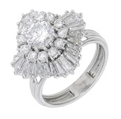 A mid 20th century diamond ballerina ring, the undulating cluster set throughout with brilliant and tapered...