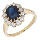 A sapphire and diamond cluster ring, the oval-cut sapphire in a surround of brilliant-cut diamonds, Swedish assay...