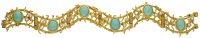 A turquoise and diamond bracelet, of undulating openwork design, formed of textured branches and set with turquoise...