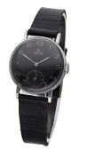 Omega. A stainless steel wristwatch, circa 1926.
Movement: manual winding, 15 jewels.
Dial: black, Arabic...
