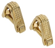 A pair of mid 20th century cufflinks by Ponti Gennari, of stirrup design with textured chequered decoration,...