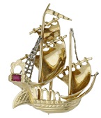 A novelty brooch, realistically modelled as a galleon with bicolour rigging, the stern set with a step-cut synthetic...