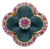 A 19th century bloodstone, ruby and diamond brooch, of quatrefoil design, the bloodstone cabochon with applied...