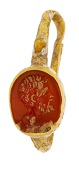 A 16th - 17th century intaglio carnelian inset ring, the oval carnelian bezel intaglio (chipped) carved to depict...