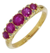 A late 19th century ruby five stone ring, the graduated circular-cut rubies with rose-cut diamonds between, the...