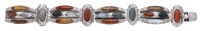 A 19th century Scottish hardstone bracelet, the curved panel links inlaid with vari-coloured agate plaques,...