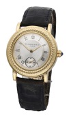 Garrard  & Co. A gold automatic wristwatch, circa 2000.
Movement: cal. 891, automatic.
Dial: silvered, Roman...