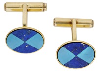 A pair of 18ct gold and hardstone cufflinks, 1988, the oval terminals set with chequered panels of lapis lazuli and...
