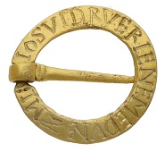 A gold annular love-token brooch, circa 12th century, the flat circular hoop with a constriction of the tapered pin,...