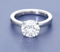 A diamond single stone ring, the brilliant-cut diamond, weighing 2.10 carats, within a four-claw setting, stamped...