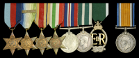 Family Group:

Seven: Lieutenant-Commander L. M. Norton, Royal Naval Reserve (Trawler Reserve), Fishery...