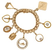 A charm bracelet, the woven strap suspending various charms to include a Venetian gondola, a cultured pearl heart...