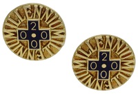 A pair of 18ct gold and enamel cufflinks by Deakin & Francis, 2000, the circular panels with blue enamel ‘2000’...
