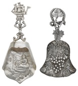 A Victorian silver caddy spoon, the shovel-shaped bowl repoussé decorated with fruiting vine, the handle with vine...
