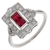 A synthetic ruby and diamond ring, the pierced panel set with two calibré-cut synthetic rubies within an old...